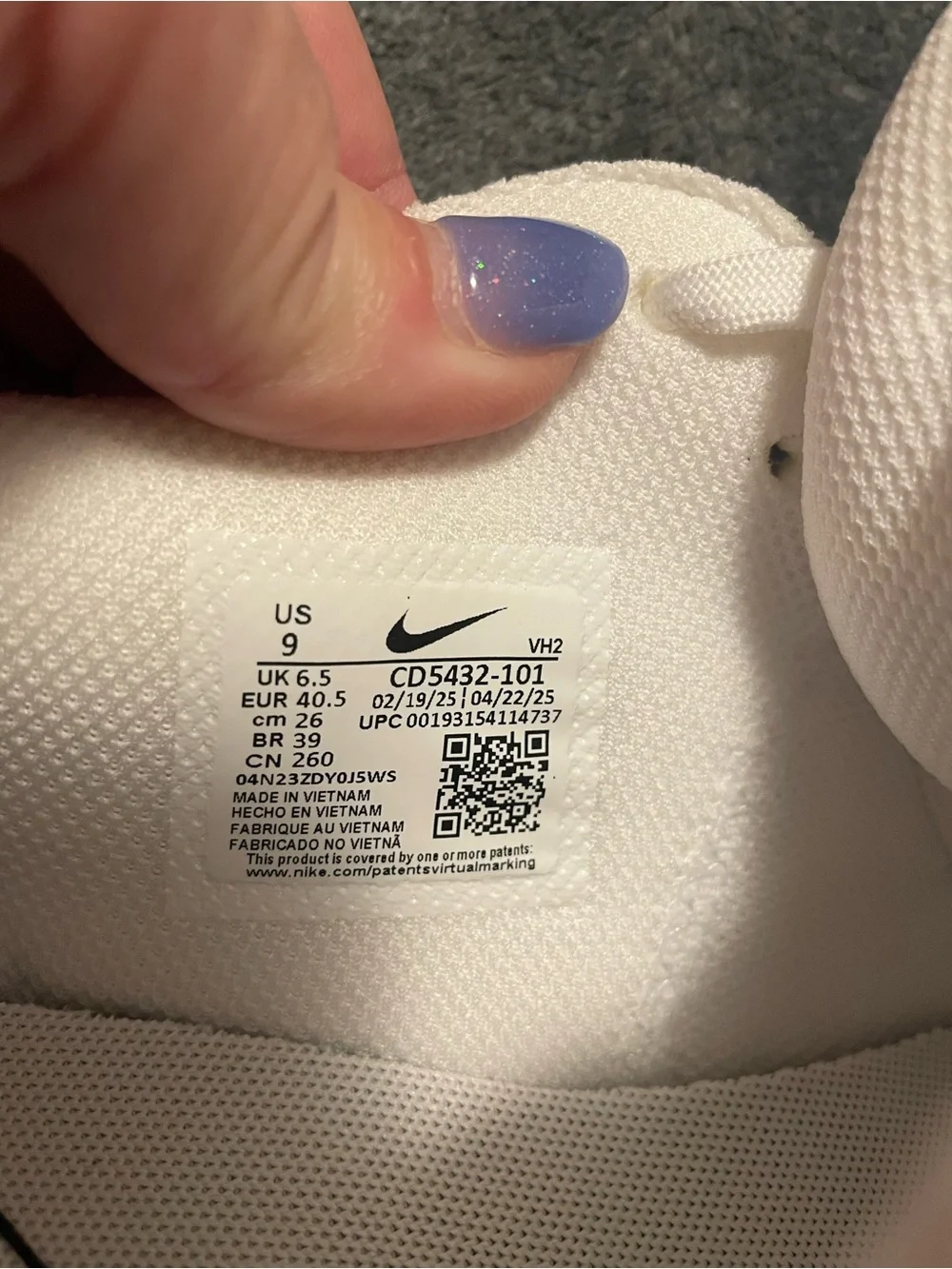 Nike White Sneakers with Black Swoosh